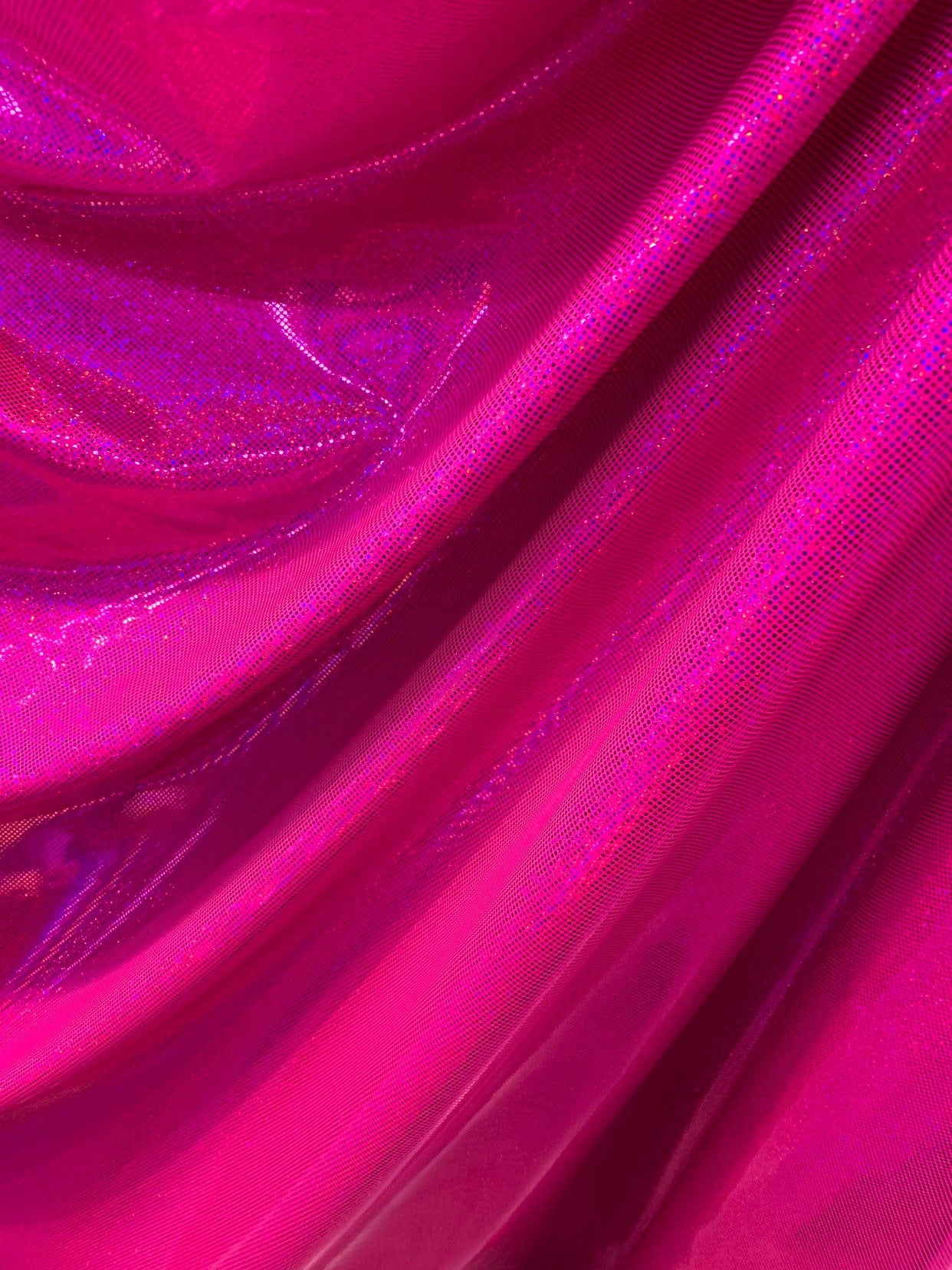 Hologram metallic dots hot pink fushia nylon spandex 4way stretch 58/60" Sold by the YD. Ships worldwide from Los Angeles California USA