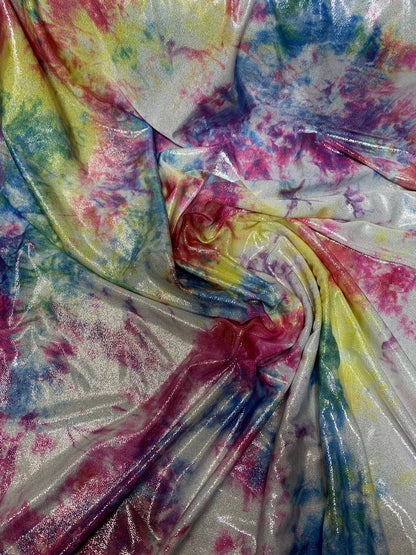 New tie dye metallic nylon spandex with foggy foil all over 4way stretch 58/60" Sold by the YD. Ships worldwide from Los Angeles California.