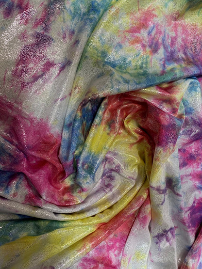 New tie dye metallic nylon spandex with foggy foil all over 4way stretch 58/60" Sold by the YD. Ships worldwide from Los Angeles California.