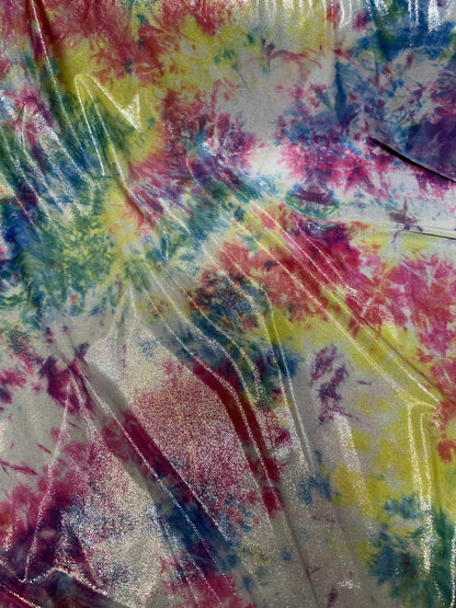 New tie dye metallic nylon spandex with foggy foil all over 4way stretch 58/60" Sold by the YD. Ships worldwide from Los Angeles California.