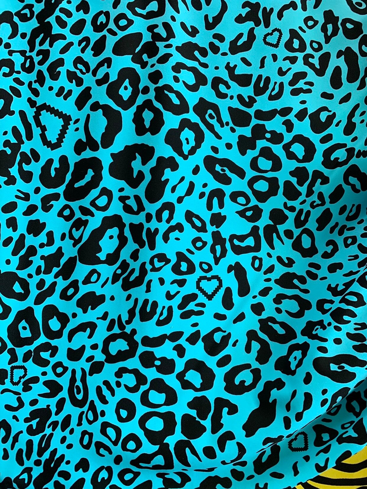 New leopard design blue/black nylon spandex 4way stretch 58/60" Sold by the YD. Ships worldwide from Los Angeles California USA.