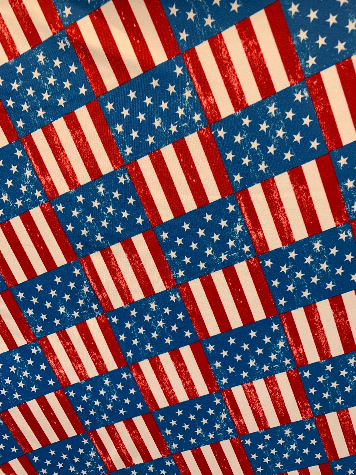 New American flag design print on great nylon spandex 4way stretch 58/60" Sold by the YD. Ships worldwide from Los Angeles California USA.