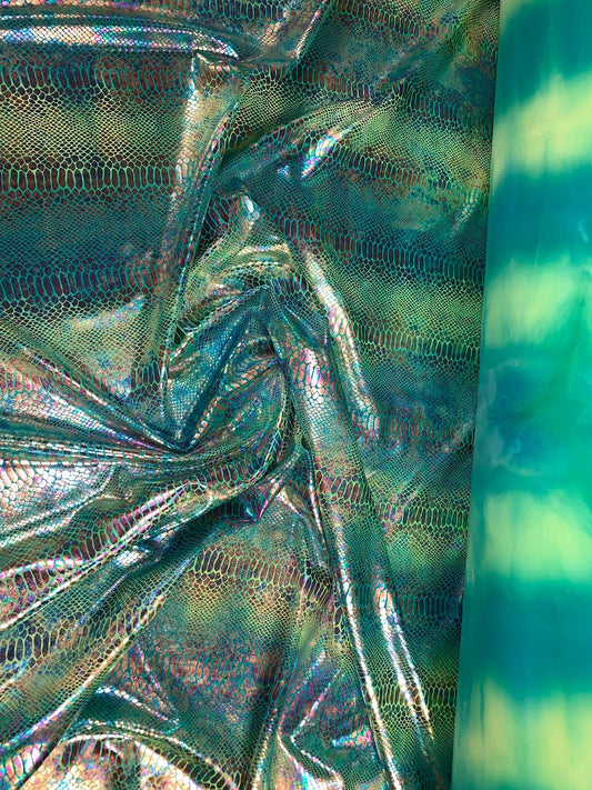 New Iridescent hologram snake design with tie dye ilusión foil 4way stretch 58/60" Sold by the YD. Ships worldwide from Los Angeles CA USA.