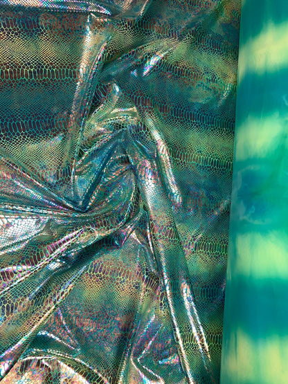 New Iridescent hologram snake design with tie dye ilusión foil 4way stretch 58/60" Sold by the YD. Ships worldwide from Los Angeles CA USA.