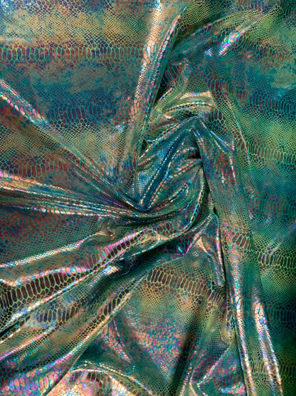 New Iridescent hologram snake design with tie dye ilusión foil 4way stretch 58/60" Sold by the YD. Ships worldwide from Los Angeles CA USA.