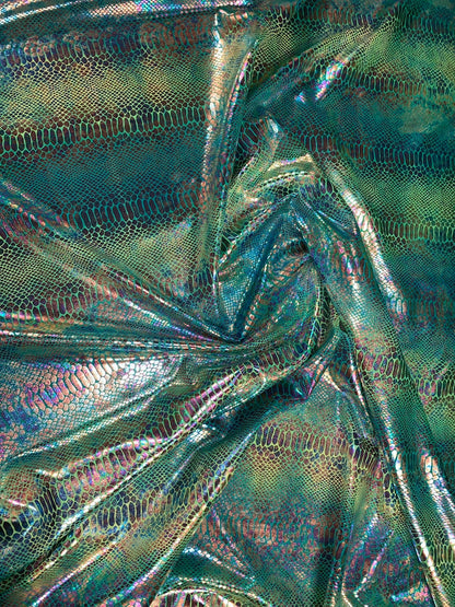 New Iridescent hologram snake design with tie dye ilusión foil 4way stretch 58/60" Sold by the YD. Ships worldwide from Los Angeles CA USA.