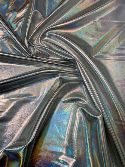 Iridescent silver all over foil metallic haevy nylon spandex 4way stretch 58/60" Sold bybthe YD. Ships worldwide from Los Angeles California