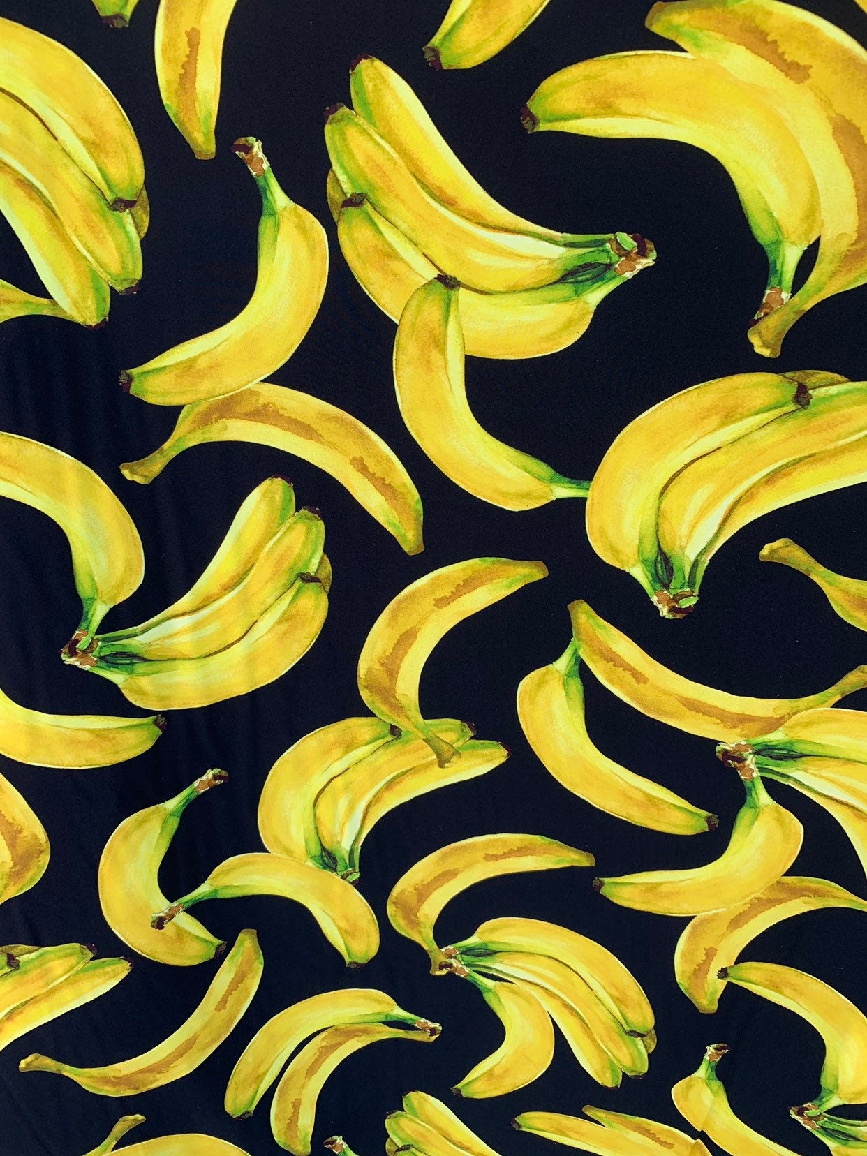 New bananas design black/yellow print on nylon spandex 4way stretch 58/60" Sold by the YD. Ships worldwide from Los Angeles California USA.