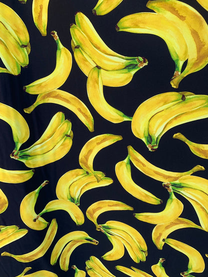 New bananas design black/yellow print on nylon spandex 4way stretch 58/60" Sold by the YD. Ships worldwide from Los Angeles California USA.