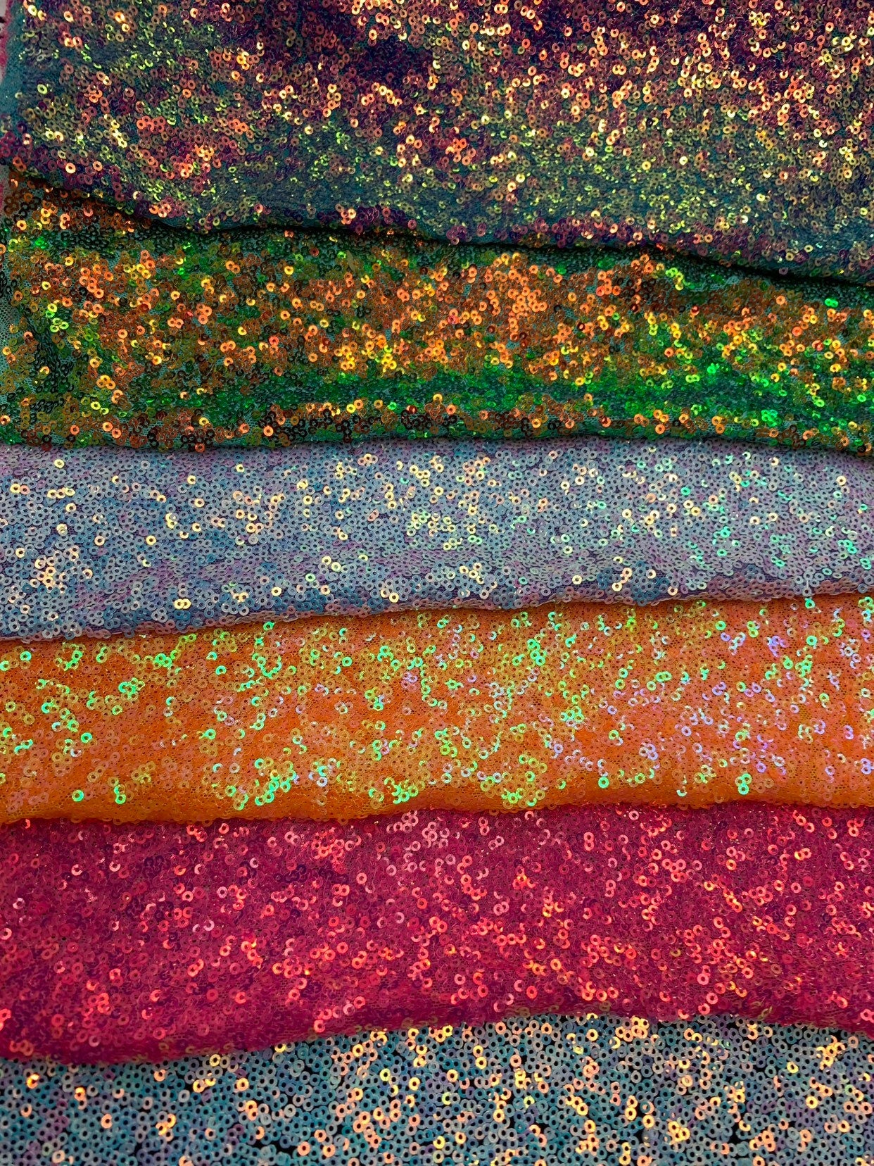 New iridescent mini disco sequins 3mm on stretch mesh 4way 58/60" Sold by the YD. Ships worldwide from Los Angeles California USA.