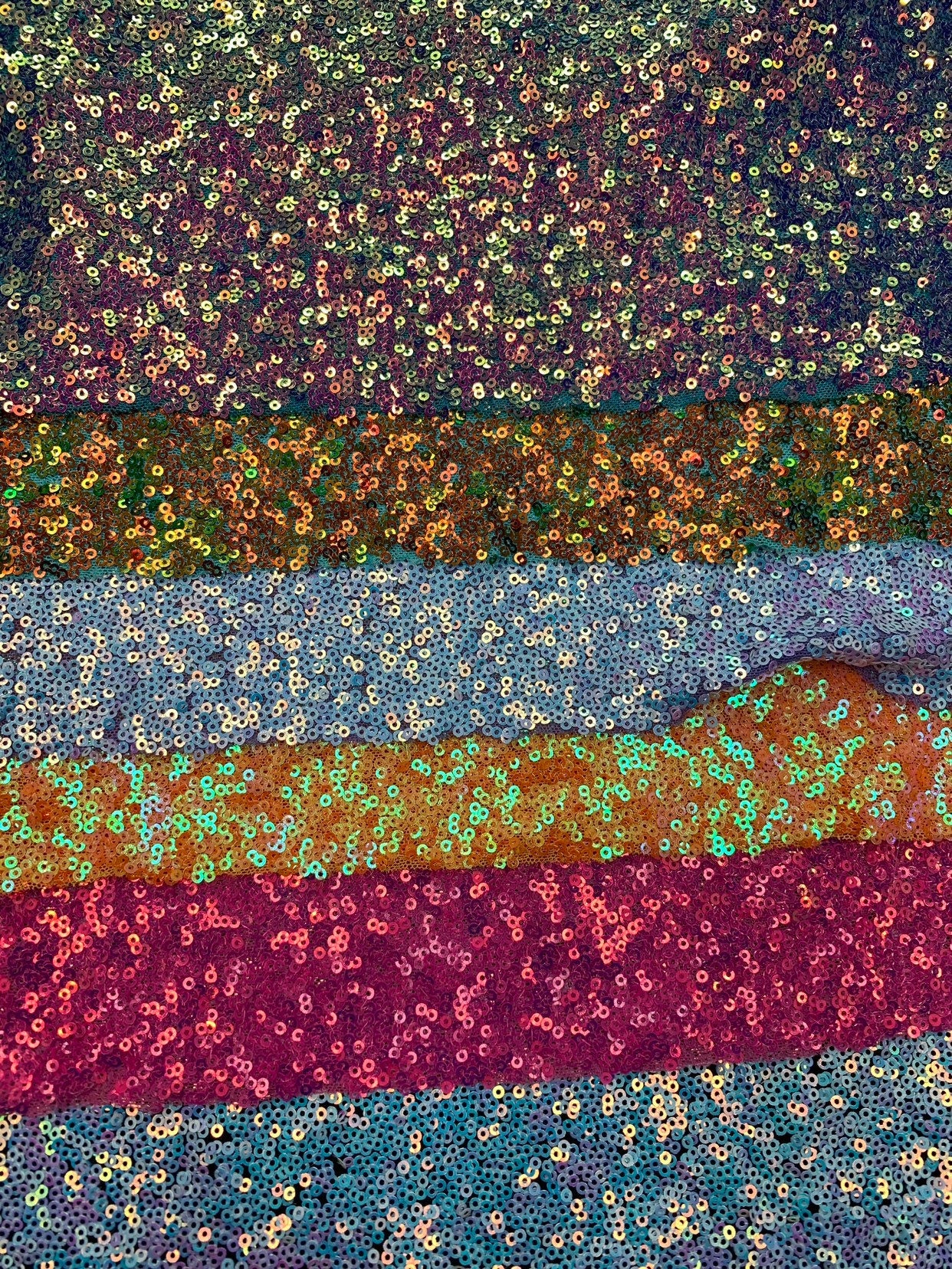 New iridescent mini disco sequins 3mm on stretch mesh 4way 58/60" Sold by the YD. Ships worldwide from Los Angeles California USA.