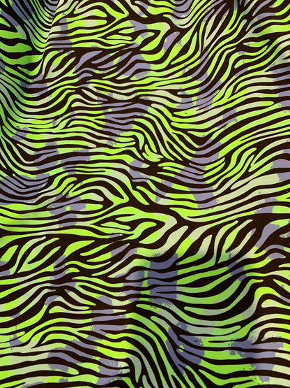 New zebra design Neon green print on heavy nylon spandex 4way stretch 58/60" Sold by the YD. Ships worldwide from Los Angeles California USA