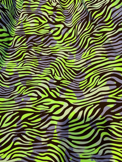 New zebra design Neon green print on heavy nylon spandex 4way stretch 58/60" Sold by the YD. Ships worldwide from Los Angeles California USA