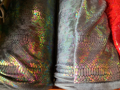 New Iridescent Alligator design hologram clear ilusión foil on heavy stretch velvet 4way stretch 58/60" Sold by the YD. Ships worldwide.