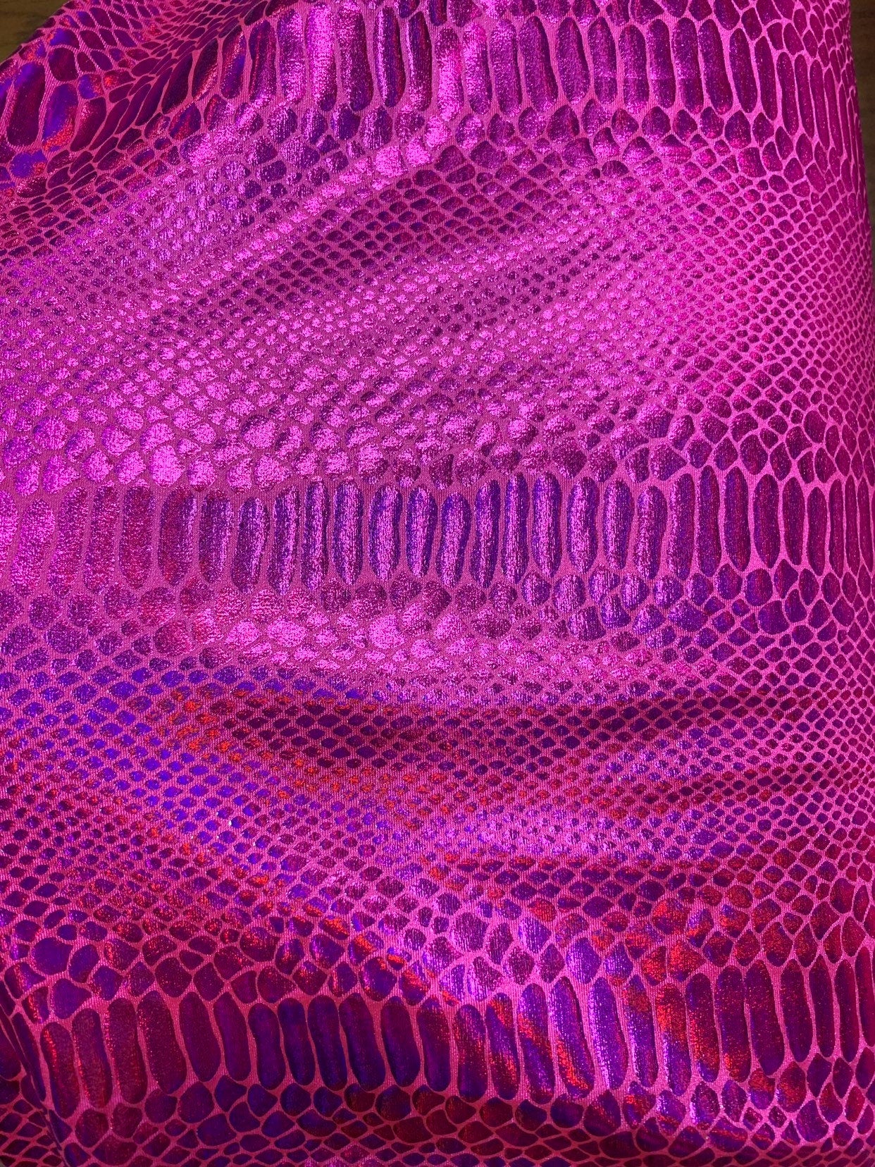 New fever snake design iridescent hologram foil on nylon spandex 4way stretch 58/60" Sold by the YD. Ships worldwide from Los Angeles CA.