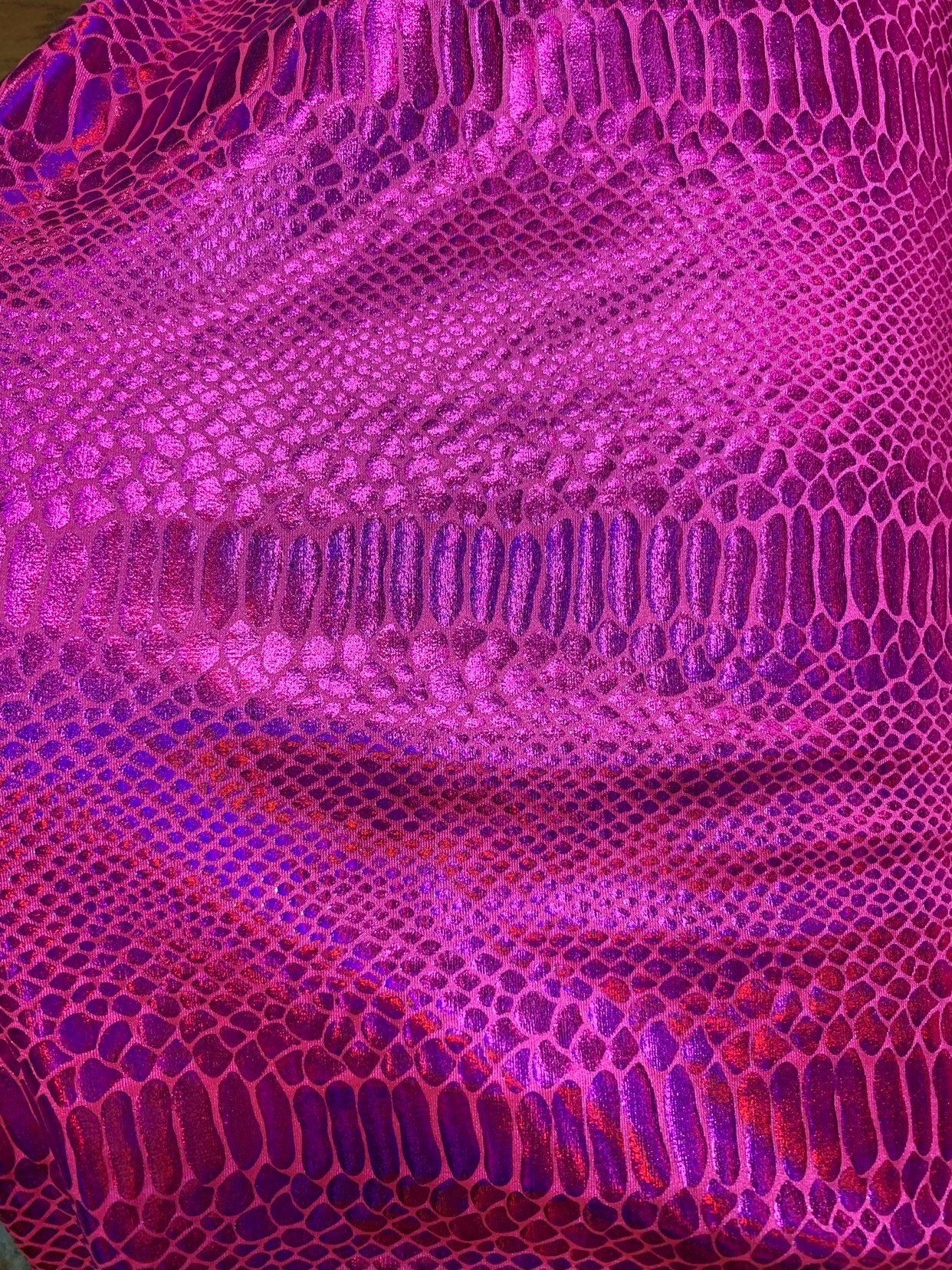 New fever snake design iridescent hologram foil on nylon spandex 4way stretch 58/60" Sold by the YD. Ships worldwide from Los Angeles CA.