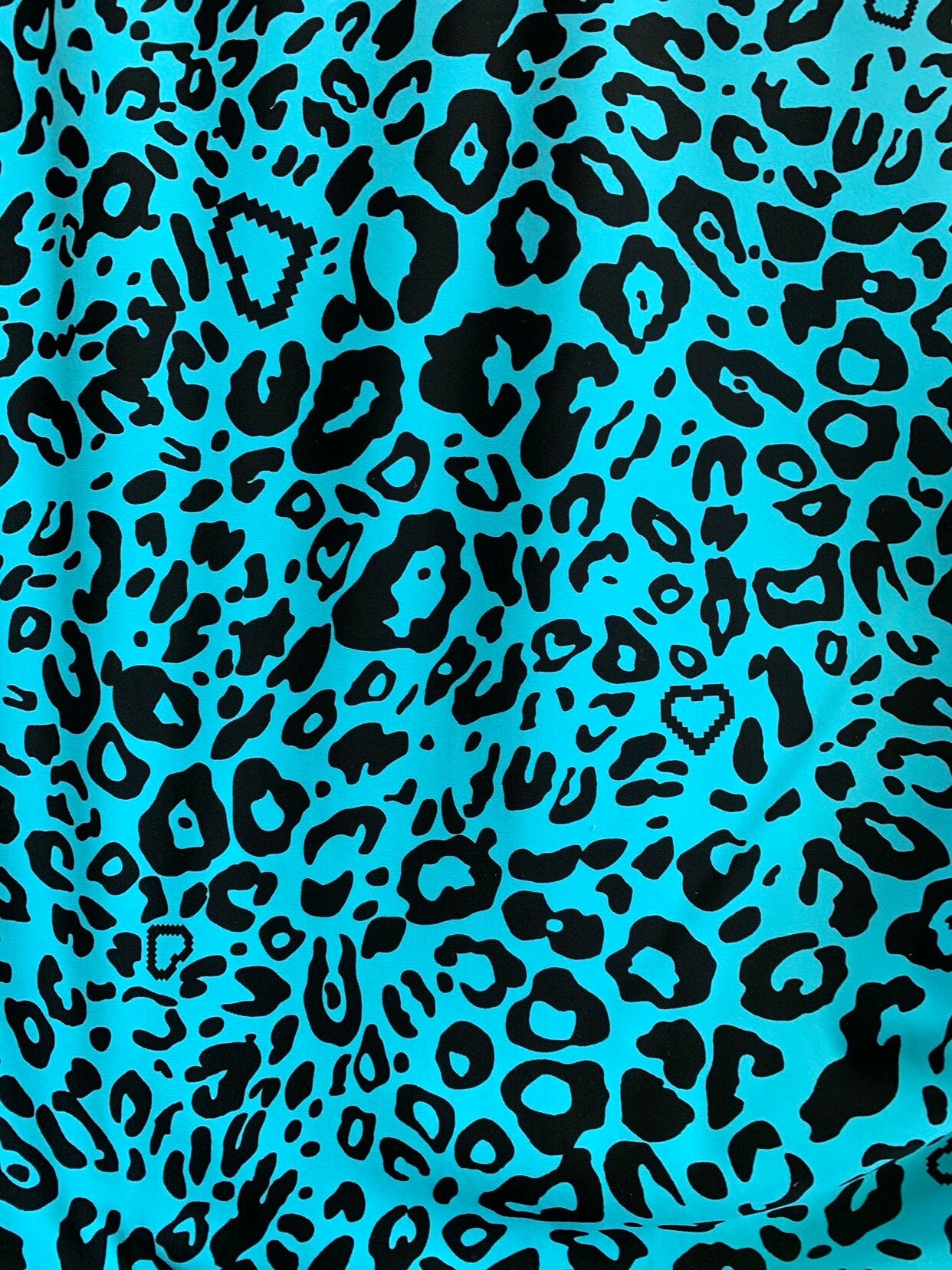 New leopard design blue/black nylon spandex 4way stretch 58/60" Sold by the YD. Ships worldwide from Los Angeles California USA.