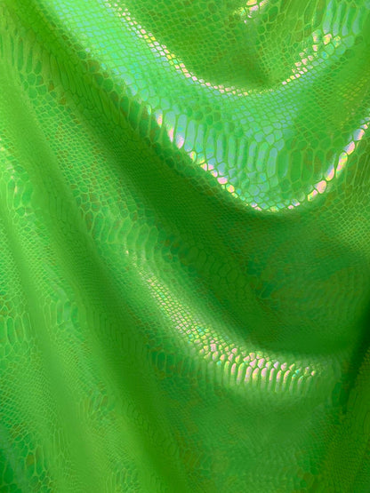 New Iridescent cobra snake design with clear ilusión foil print on heavy nylon spandex 4way stretch-Hologram spandex 58/60" Sold by the YD.