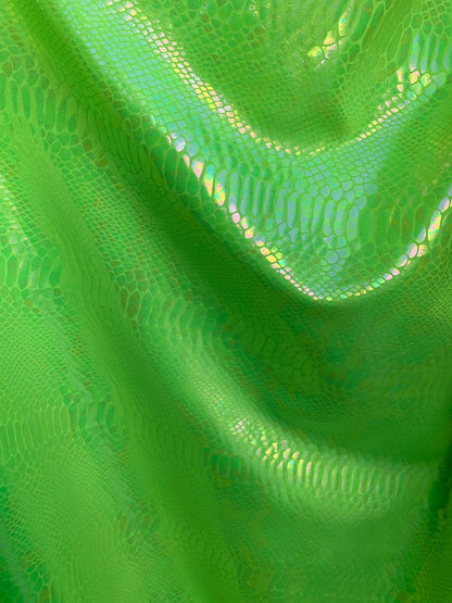 New Iridescent cobra snake design with clear ilusión foil print on heavy nylon spandex 4way stretch-Hologram spandex 58/60" Sold by the YD.