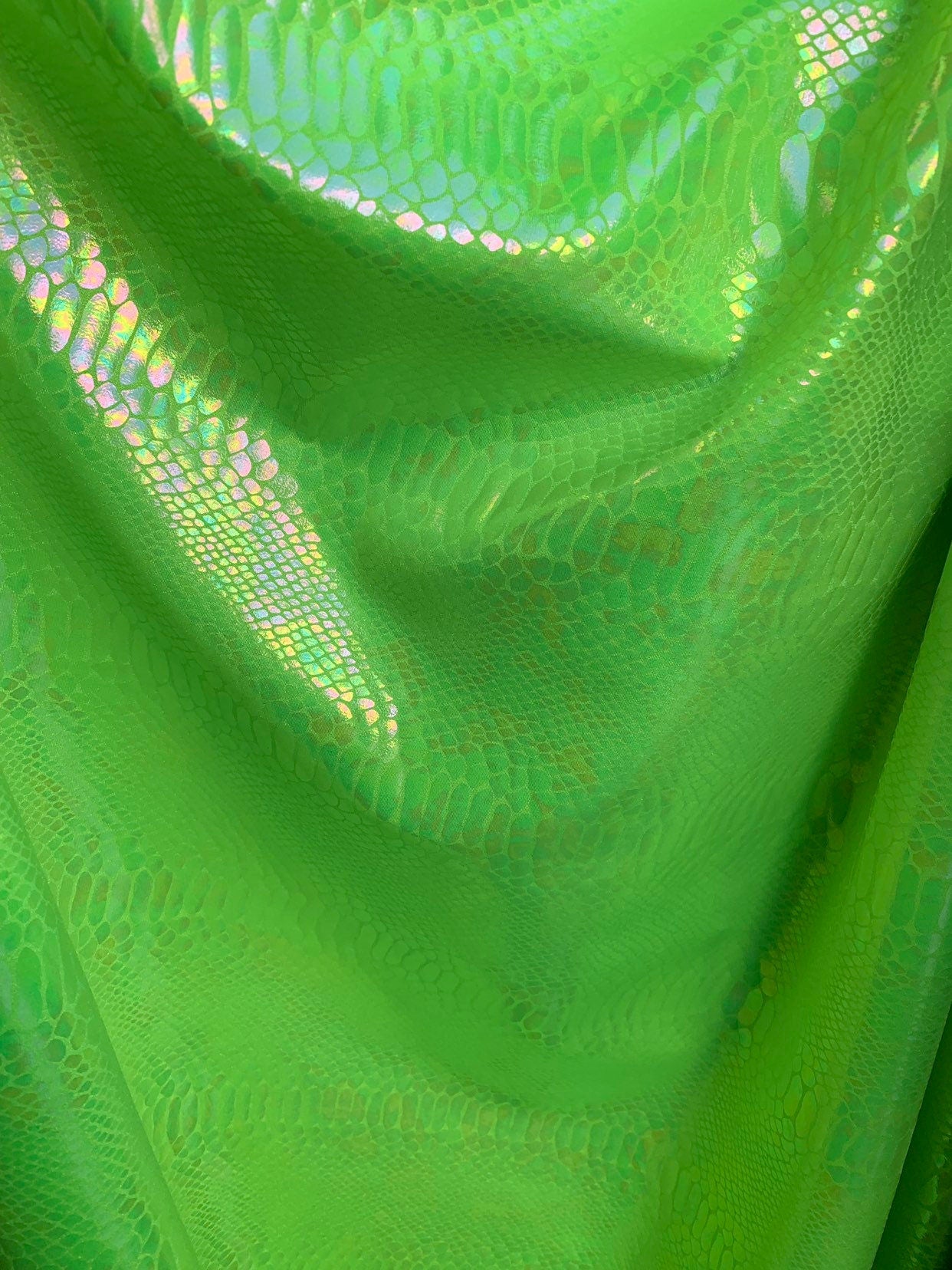 New Iridescent cobra snake design with clear ilusión foil print on heavy nylon spandex 4way stretch-Hologram spandex 58/60" Sold by the YD.