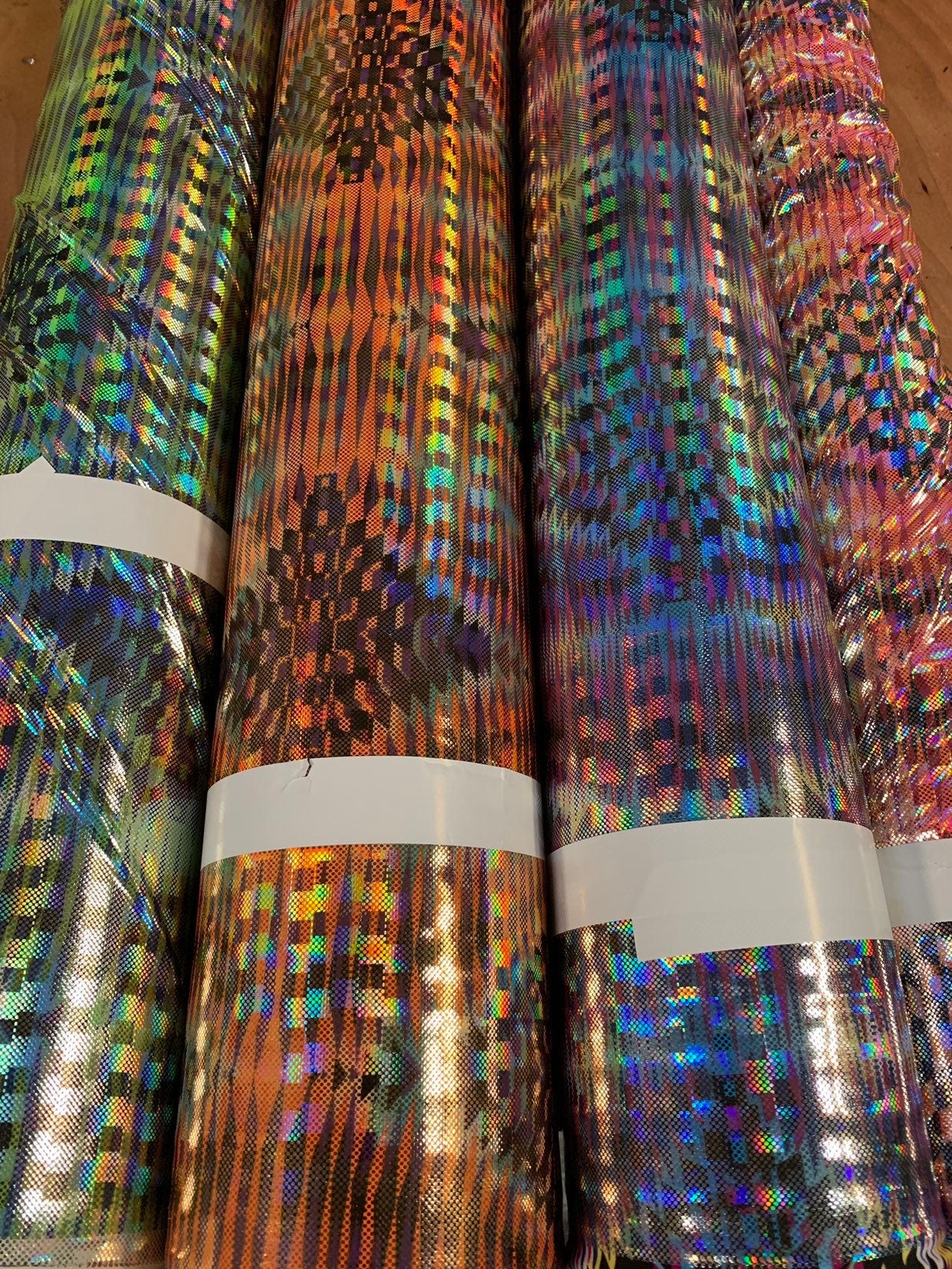 New 3D hologram diamond design iridescent metallic nylon spandex 4way stretch 58/60" Sold by the YD. Ships worldwide from Los Angeles CA USA