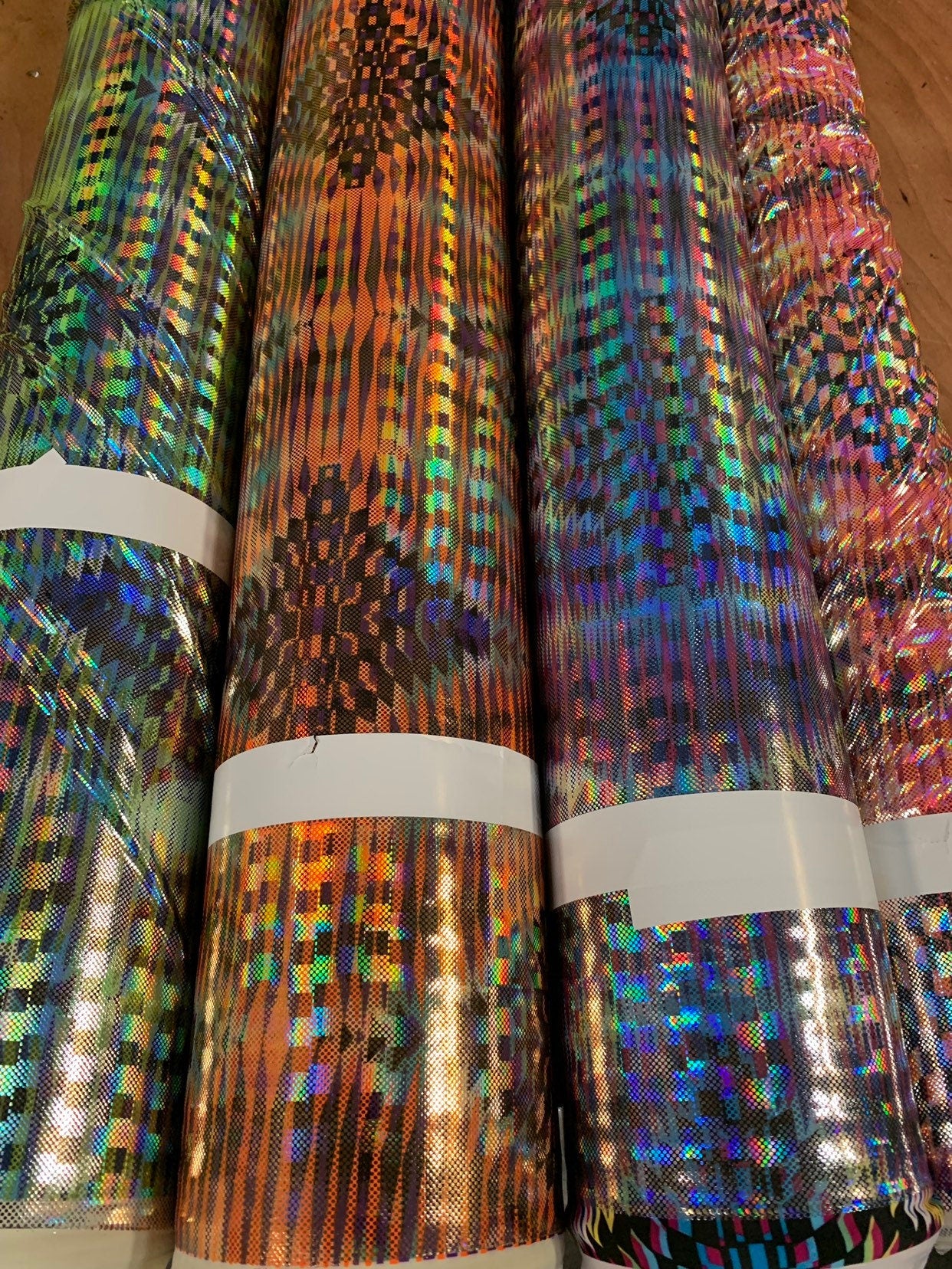 New 3D hologram diamond design iridescent metallic nylon spandex 4way stretch 58/60" Sold by the YD. Ships worldwide from Los Angeles CA USA