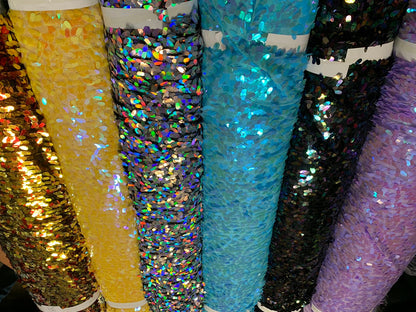 New raindrops sequins medium size on stretch mesh 2 way 55/57" Sold by the YD. Ships worldwide from Los Angeles California USA.