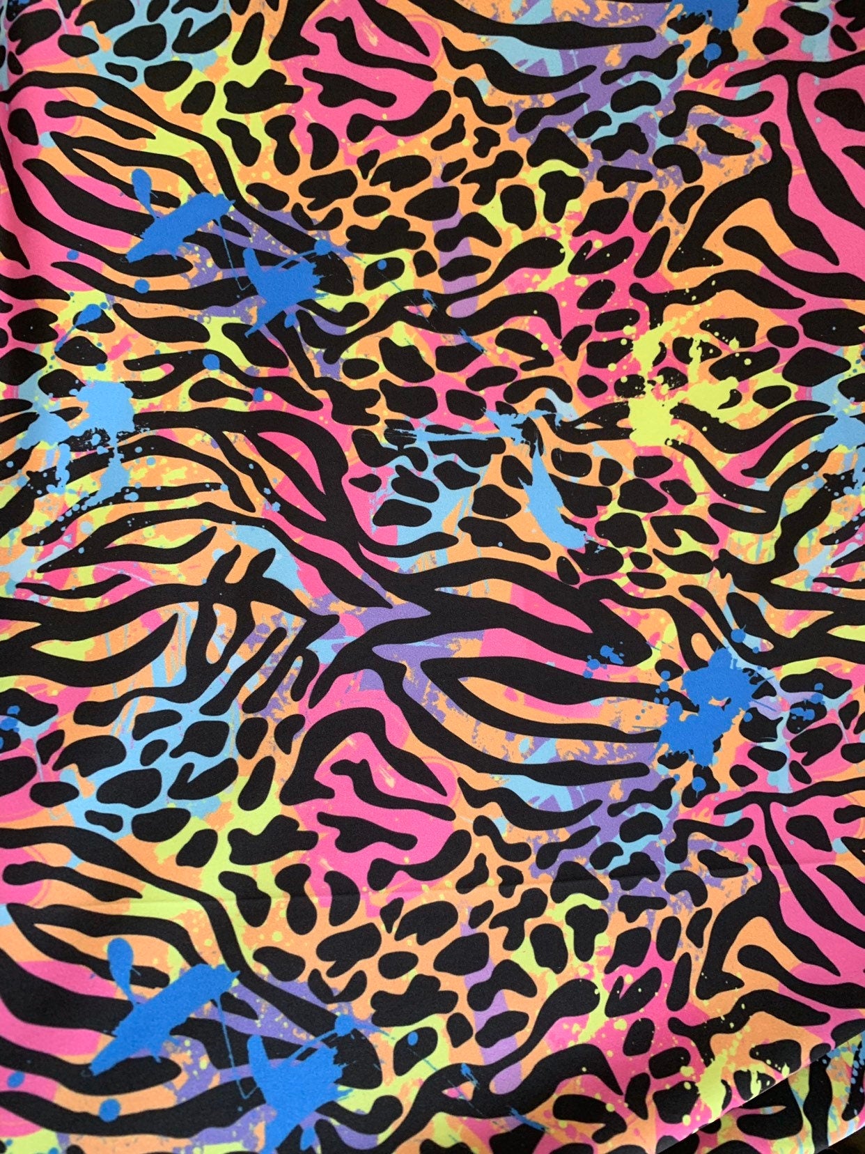 New multiple animal print design on heavy nylon spandex 4way stretch 58/60" Sold by the YD. Ships worldwide from Los Angeles California USA.