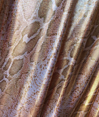 New rose gold metallic snake design nylon spandex with hologram foggy foil 4way stretch 58/60" Sold by the YD. Ships worldwide from L.A CA.