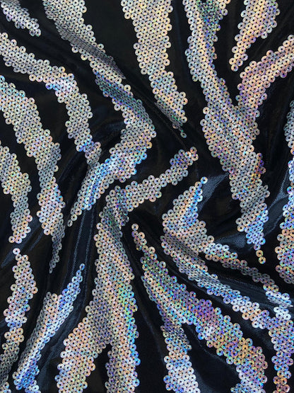 New metallic nylon spandex sequins zebra looking with foggy foil all over 4way stretch 58/60" Sold by the YD. Ships worldwide from L.A CA