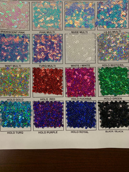 New Disney sequins cosmic iridescent mini glitz sequins embroidered on stretch power mesh 4-Way 55/56" Sold by the YD. Ships worldwide