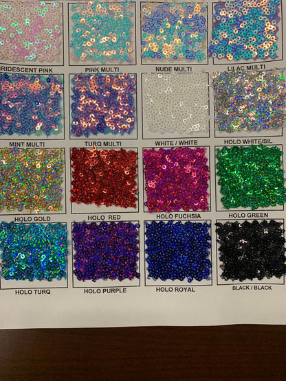 New Disney sequins cosmic iridescent mini glitz sequins embroidered on stretch power mesh 4-Way 55/56" Sold by the YD. Ships worldwide