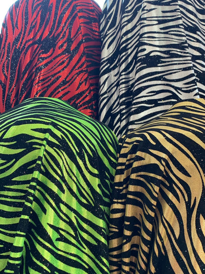 New zebra design with black flocking metallic nylon spandex 4-Way stretch 58/60" Sold by the YD. Ships worldwide from Los Angeles