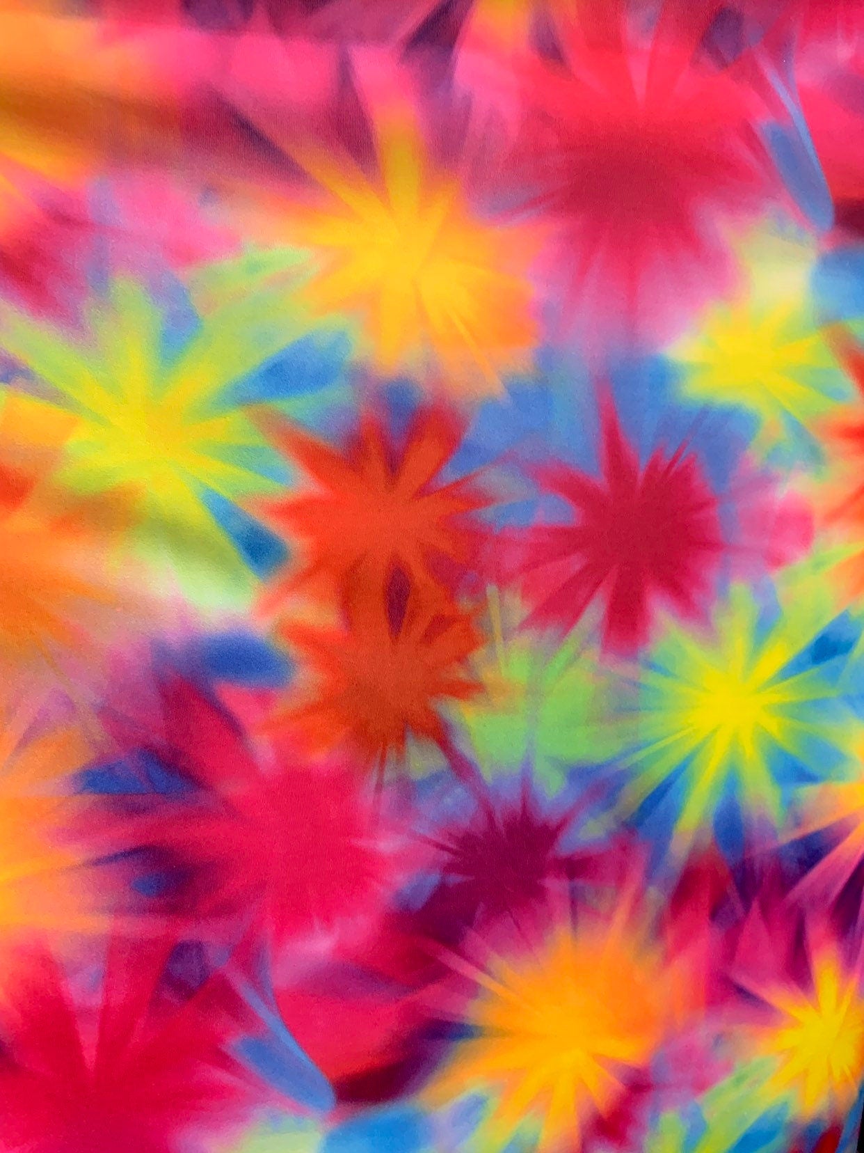 New tie dye multi stars design print on heavy nylon spandex 4way stretch 58/60" Sold by the YD. Ships worldwide from Los Angeles California