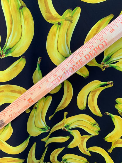 New bananas design black/yellow print on nylon spandex 4way stretch 58/60" Sold by the YD. Ships worldwide from Los Angeles California USA.