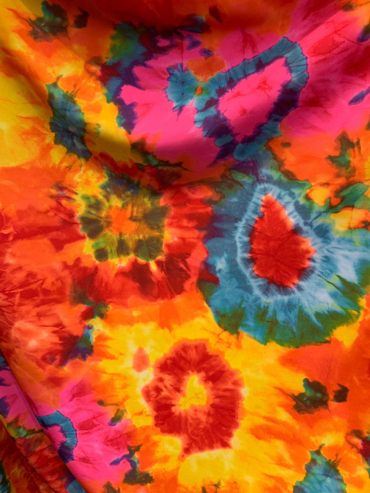 LAVA design, tie dye design nylon spandex 4way stretch 58/60" Sold by the YD. Ships worldwide from Los Angeles California USA.