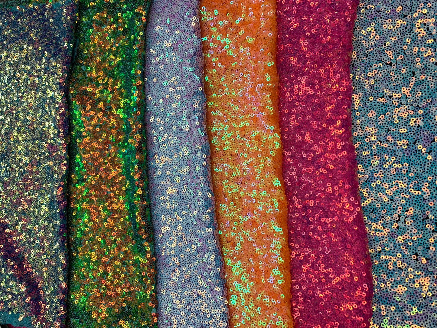 New iridescent mini disco sequins 3mm on stretch mesh 4way 58/60" Sold by the YD. Ships worldwide from Los Angeles California USA.