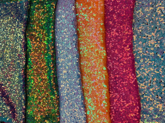 New iridescent mini disco sequins 3mm on stretch mesh 4way 58/60" Sold by the YD. Ships worldwide from Los Angeles California USA.