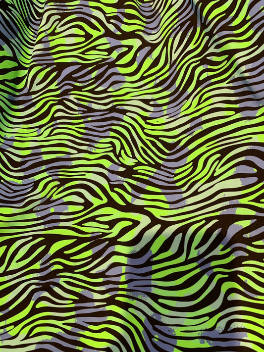 New zebra design Neon green print on heavy nylon spandex 4way stretch 58/60" Sold by the YD. Ships worldwide from Los Angeles California USA