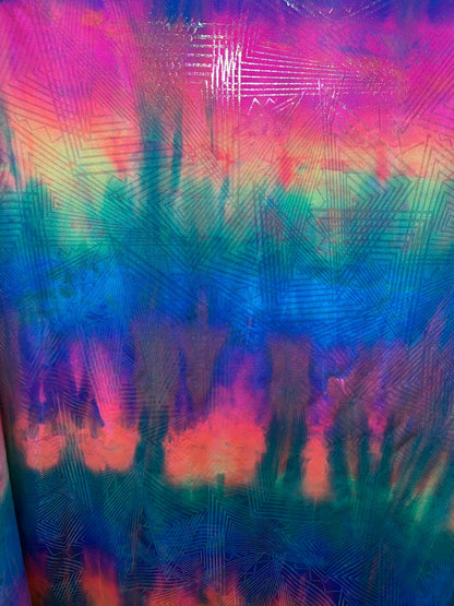 New tie dye rainbow geometric design with ilusión clear foil iridescent nylon spandex 4way stretch 58/60" Sold by the YD. Ships worldwide