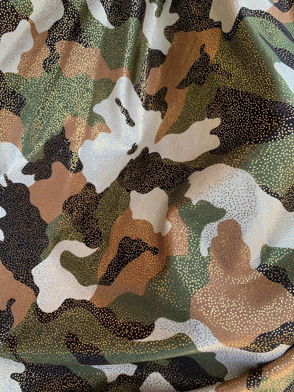 New metallic nylon spandex camouflage with all over foggy foil 4way stretch 58/60" Sold by the YD. Ships worldwide from Los Angeles CA USA.