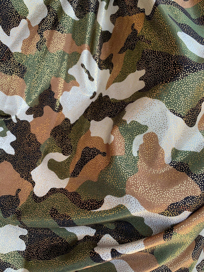 New metallic nylon spandex camouflage with all over foggy foil 4way stretch 58/60" Sold by the YD. Ships worldwide from Los Angeles CA USA.