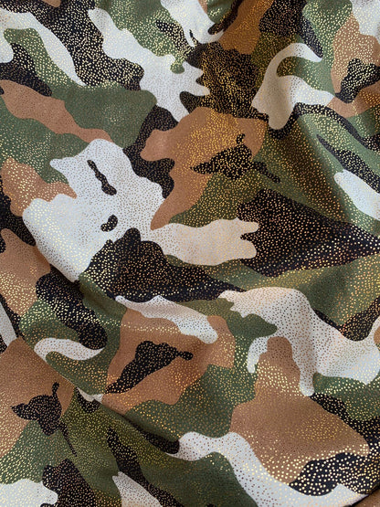 New metallic nylon spandex camouflage with all over foggy foil 4way stretch 58/60" Sold by the YD. Ships worldwide from Los Angeles CA USA.