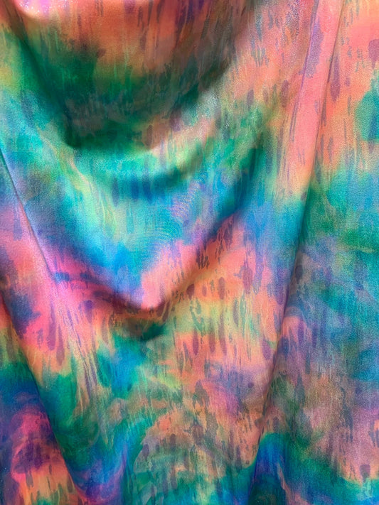 New tie dye rainbow colors with silver foil all over nylon spandex 4way stretch 58/60" Sold by the YD. Ships worldwide from Los Angeles CA.