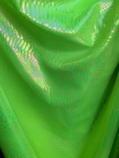 New Iridescent cobra snake design with clear ilusión foil print on heavy nylon spandex 4way stretch-Hologram spandex 58/60" Sold by the YD.