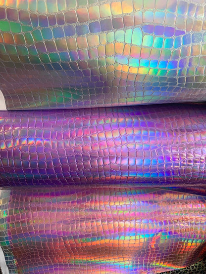 New heavy vinyl crocodile design with iridescent foil all over non stretch 58/60" Sold by the YD. Ships worldwide from Los Angeles Californi