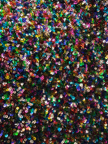 New multicolor sequins 5mm Shakira design on stretch mesh 4way stretch 55/57" Sold by the YD. Ships worldwide from Los Angeles California US