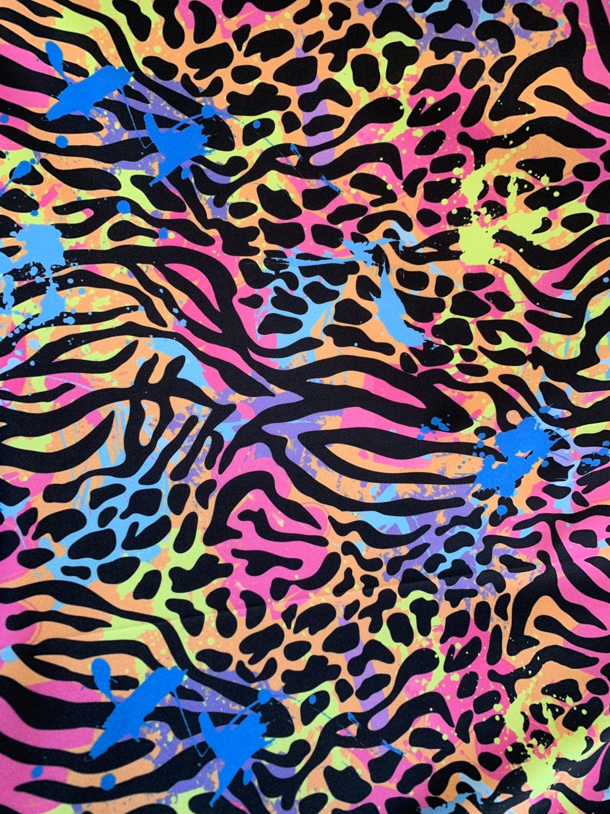 New multiple animal print design on heavy nylon spandex 4way stretch 58/60" Sold by the YD. Ships worldwide from Los Angeles California USA.