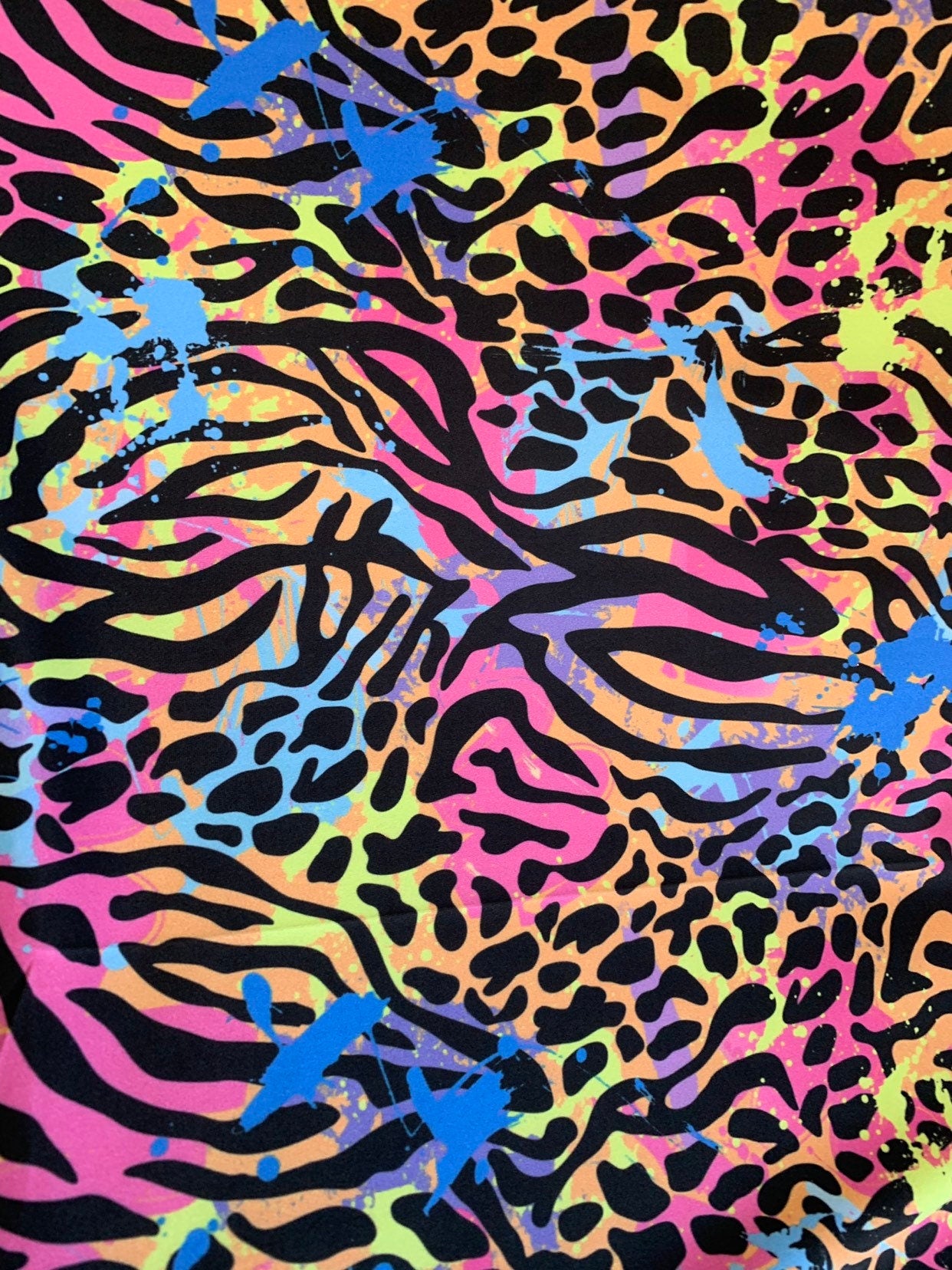 New multiple animal print design on heavy nylon spandex 4way stretch 58/60" Sold by the YD. Ships worldwide from Los Angeles California USA.