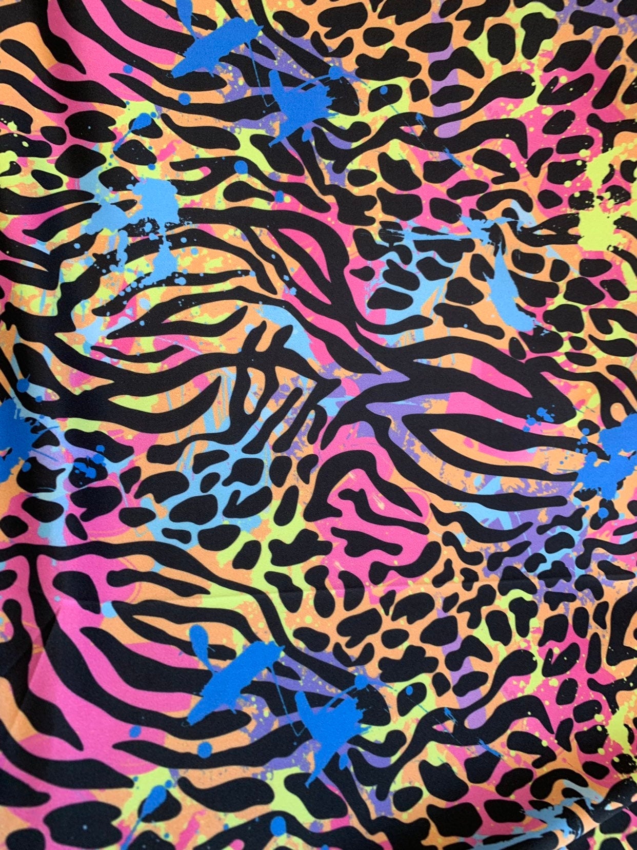 New multiple animal print design on heavy nylon spandex 4way stretch 58/60" Sold by the YD. Ships worldwide from Los Angeles California USA.